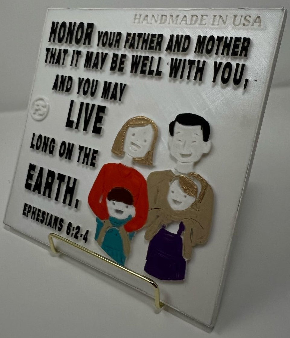 PLAQUE: HONOR YOUR FATHER AND MOTHER THAT IT MAY WELL WITH YOU, AND YOU MAY LIVE LONG ON THE EARTH