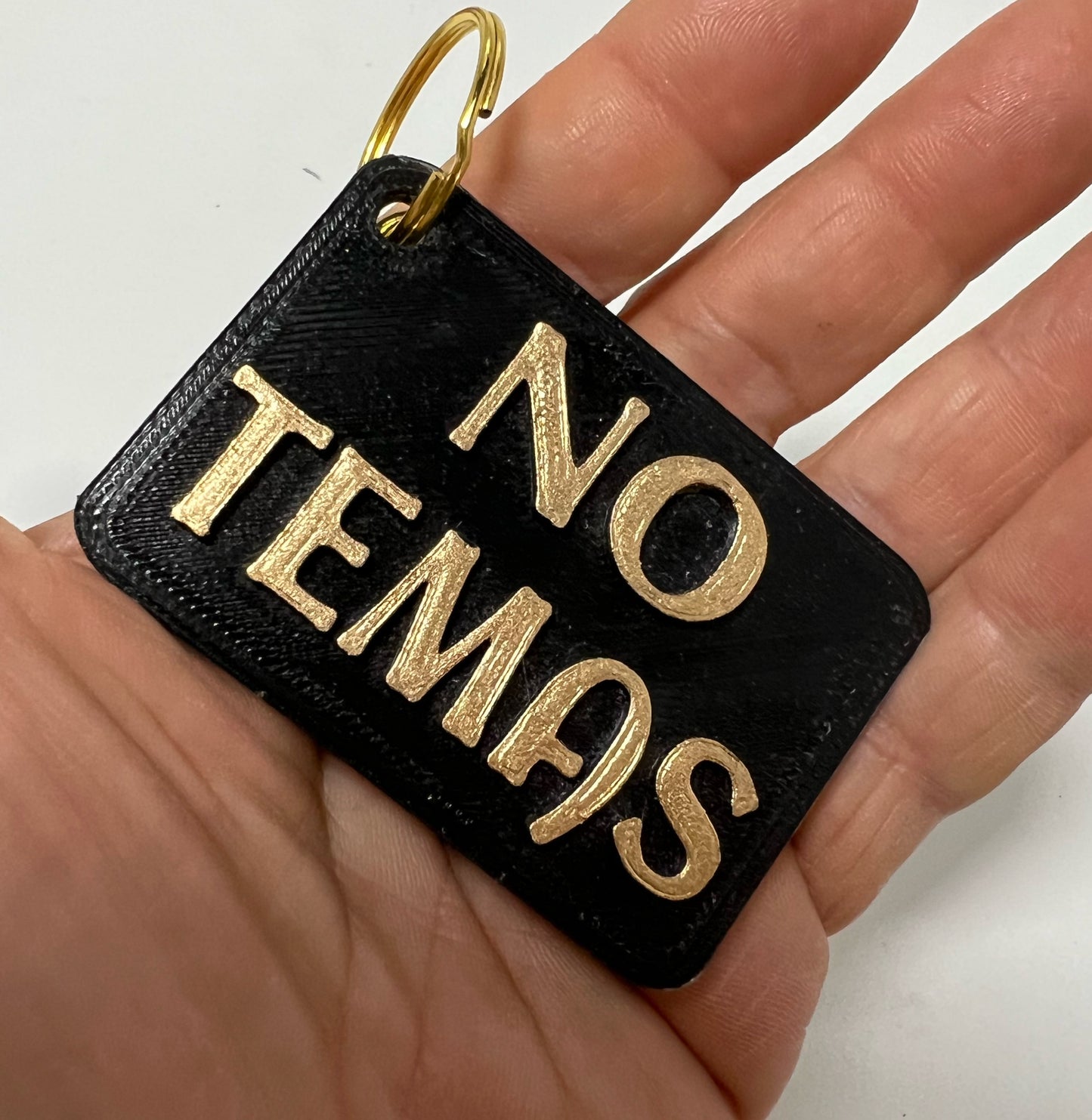 KEYCHAINS: NO TEMAS