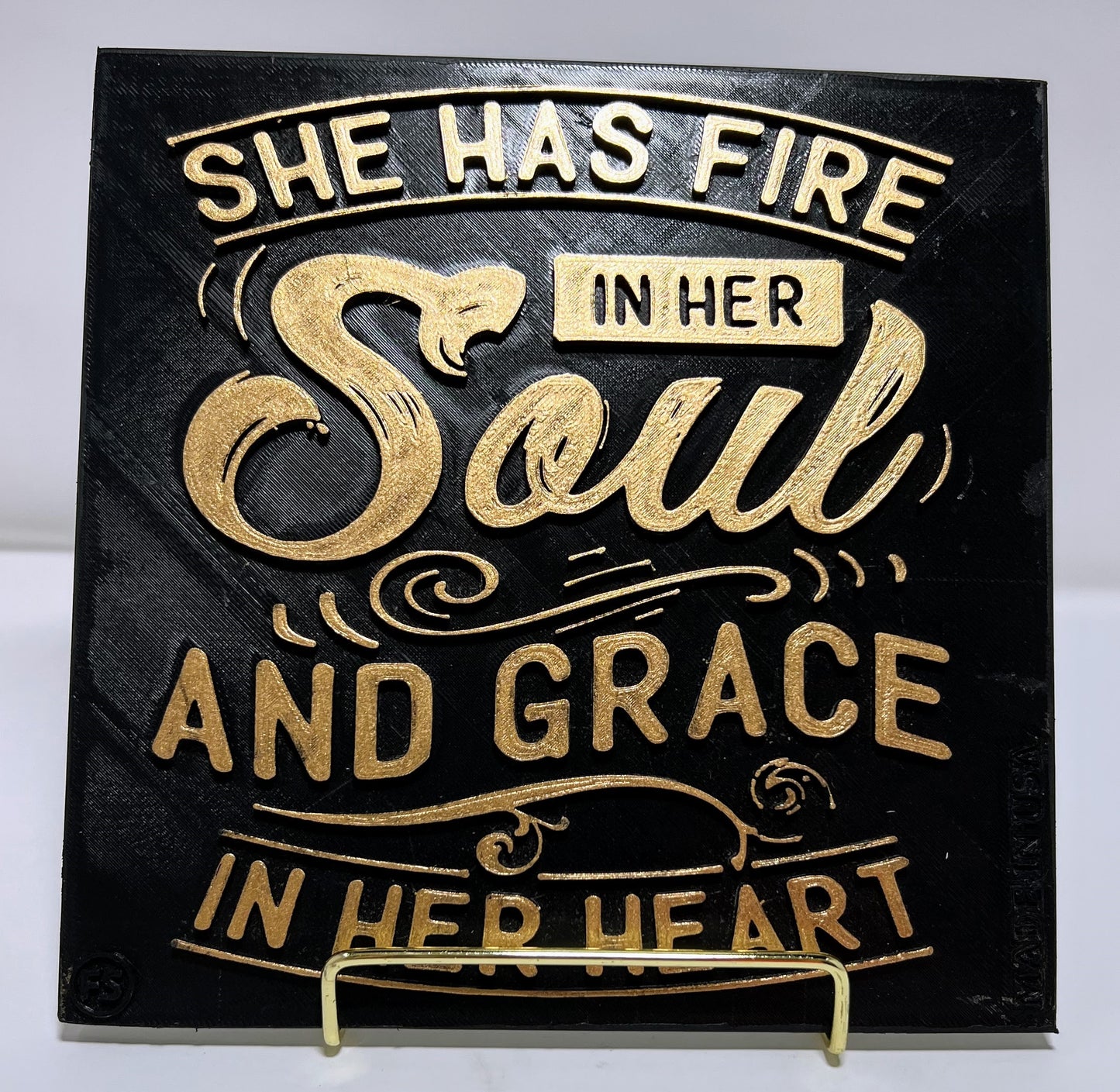 SHE HAS FIRE IN HER SOUL AND GRACE IN HER HEART