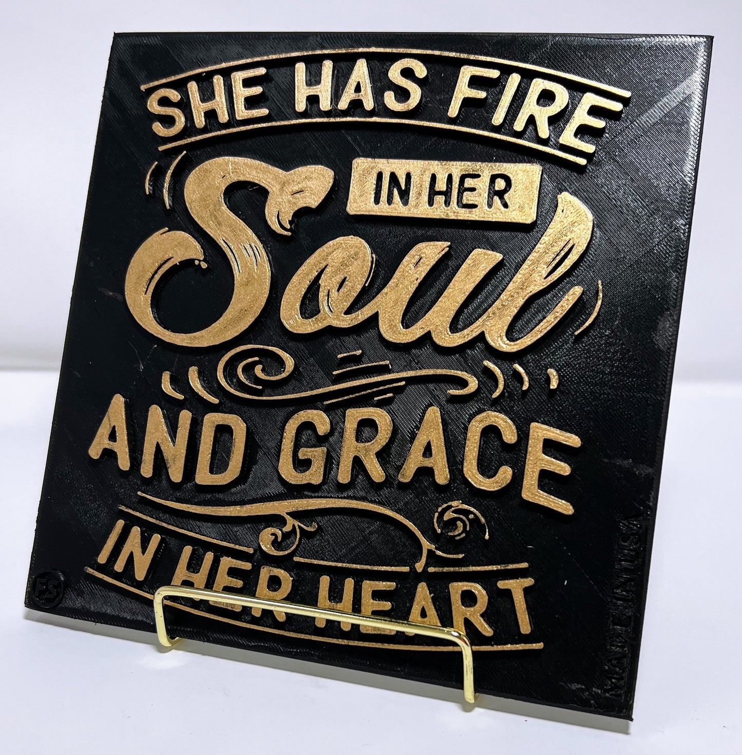 SHE HAS FIRE IN HER SOUL AND GRACE IN HER HEART