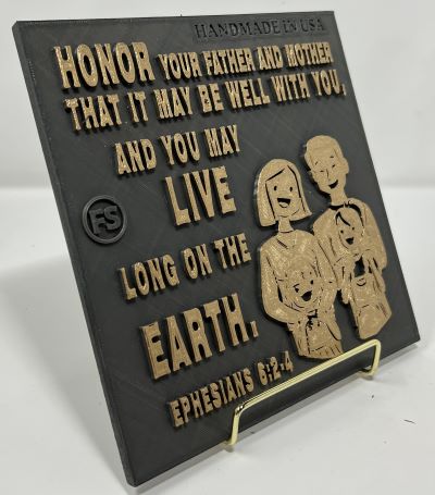 PLAQUE: HONOR YOUR FATHER AND MOTHER THAT IT MAY WELL WITH YOU, AND YOU MAY LIVE LONG ON THE EARTH