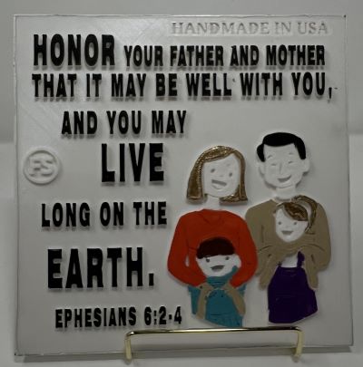 PLAQUE: HONOR YOUR FATHER AND MOTHER THAT IT MAY WELL WITH YOU, AND YOU MAY LIVE LONG ON THE EARTH