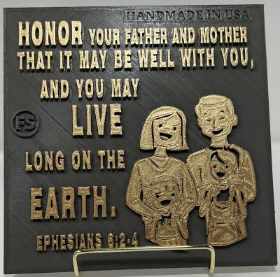 PLAQUE: HONOR YOUR FATHER AND MOTHER THAT IT MAY WELL WITH YOU, AND YOU MAY LIVE LONG ON THE EARTH